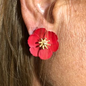 Red flower petal earrings.